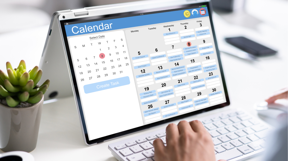 A laptop displaying a calendar.