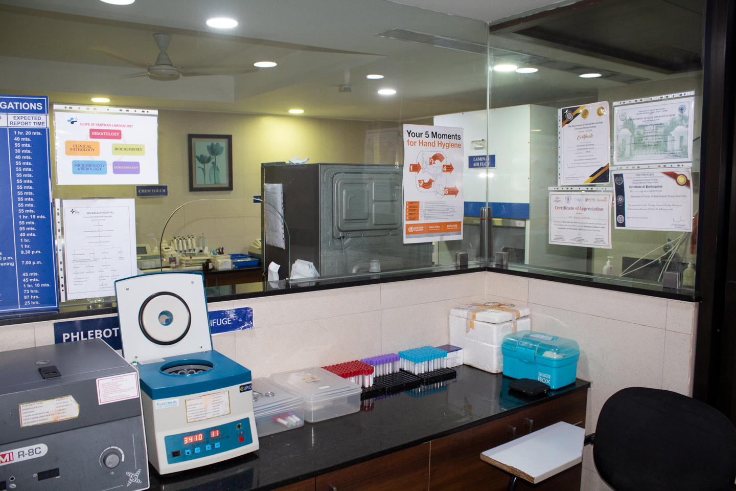 A view of the lab infrastructure at Sri Balaji Hospital with certificates of Appreciation.